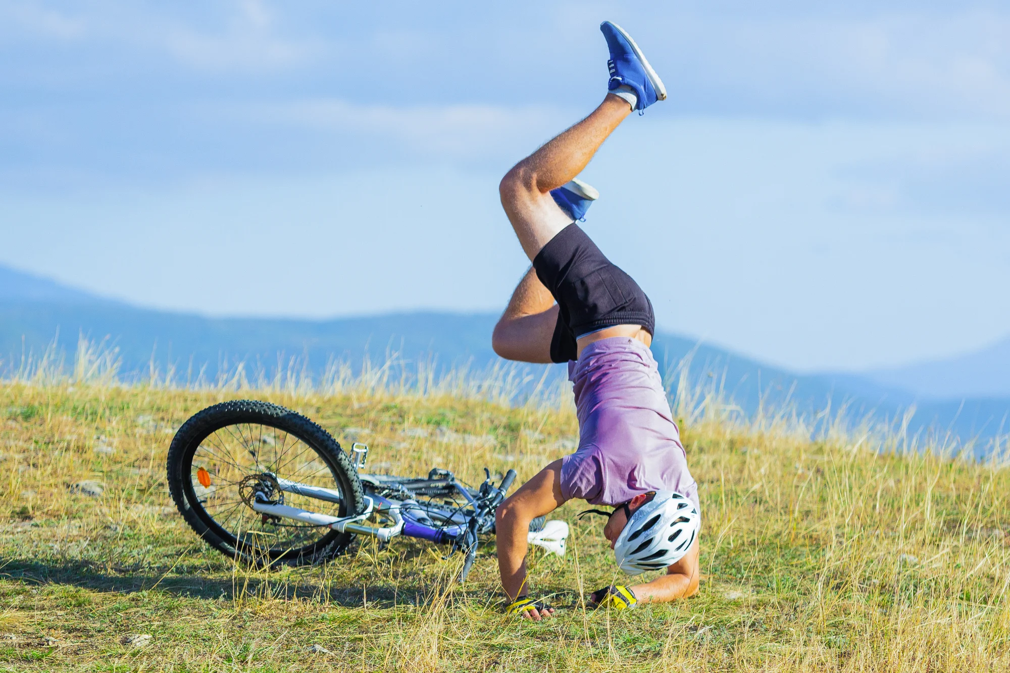 Man falling off bike