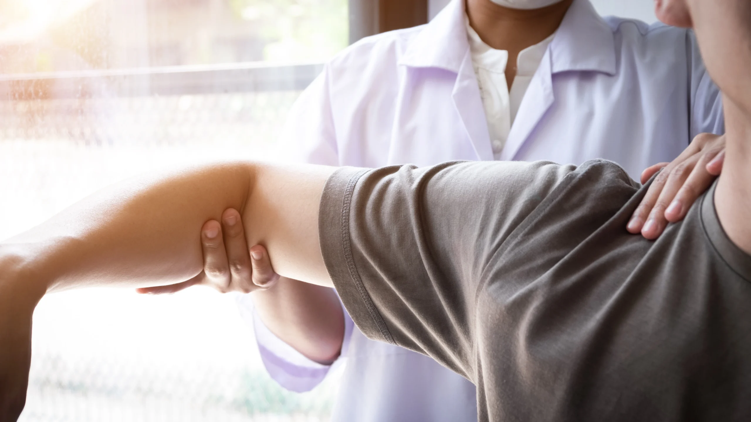 patient recovering from shoulder surgery